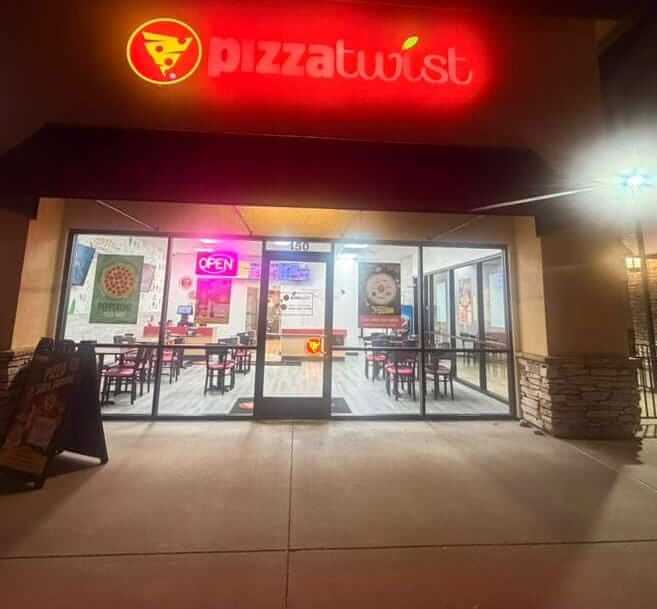Pizza Twist restaurant exterior with an "OPEN" sign. Party hall in El Dorado Hills.